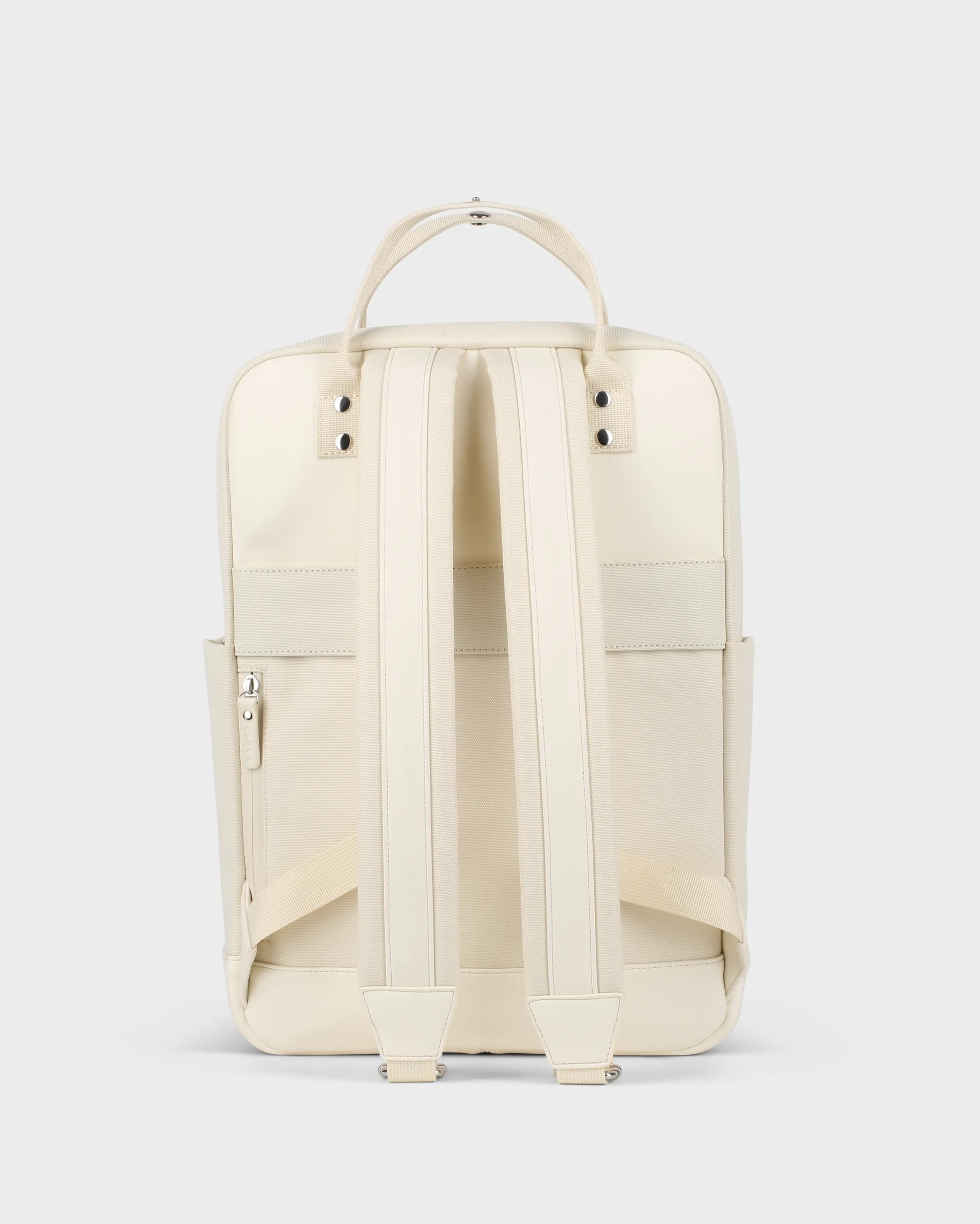 Rückansicht des beigefarbenen Casyx Rucksacks mit gepolsterten Schultergurten und dem oberen Tragegriff.